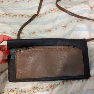 Two tones browns leather clutch